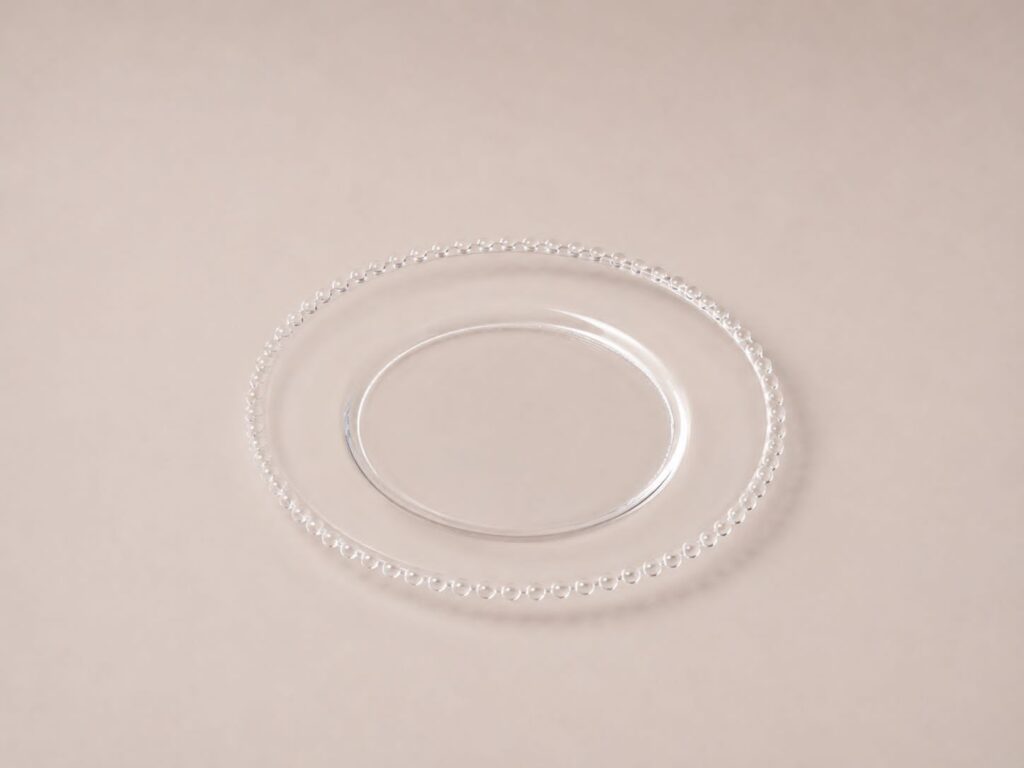 Transparenter Glas-Platzteller mit Perlenrand, 33 cm